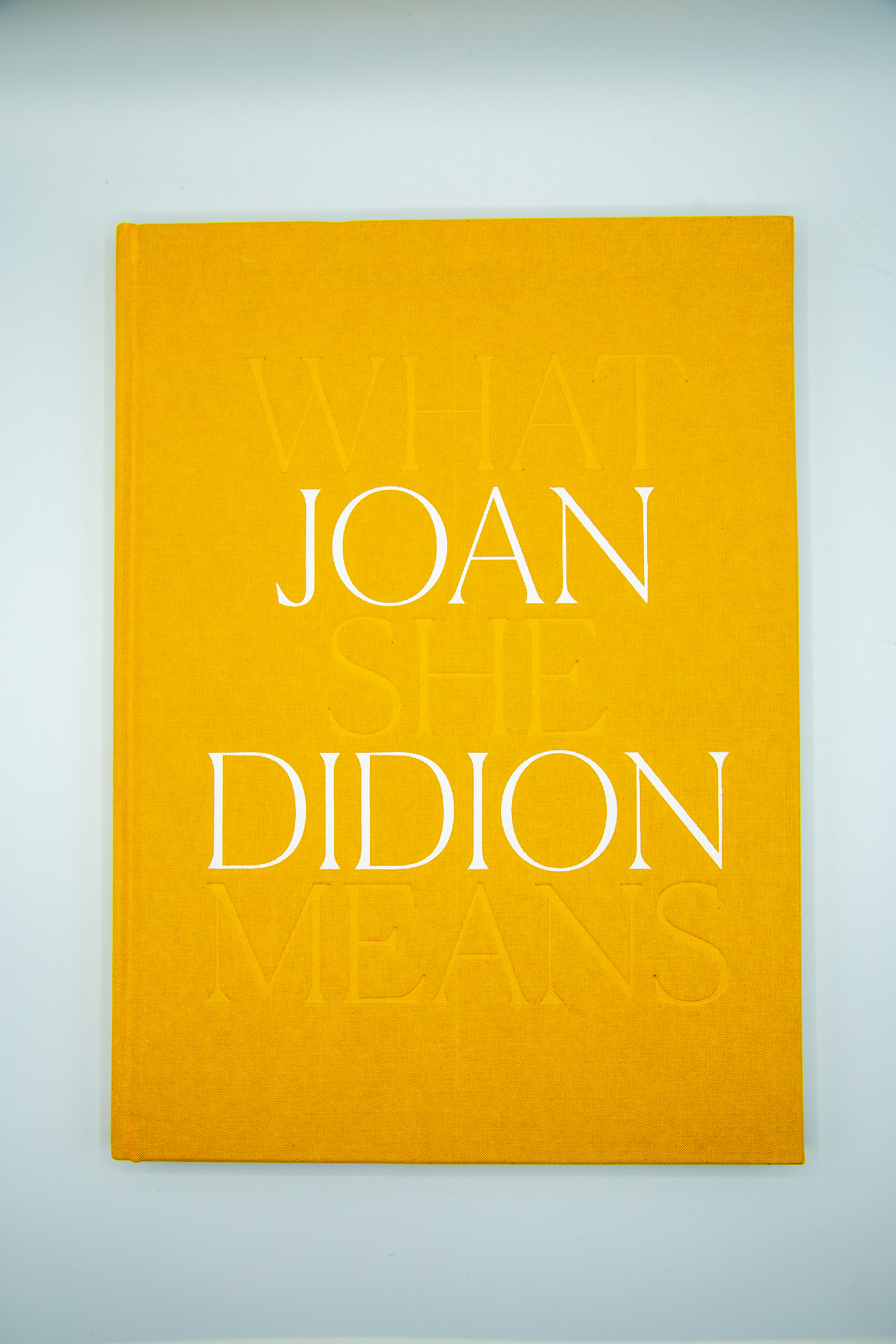 Bright yellow cover of "Joan Didion: What She Means"