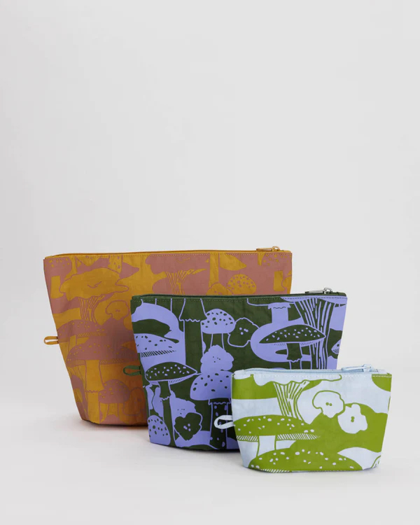 Three zipper pouches with mushroom designs