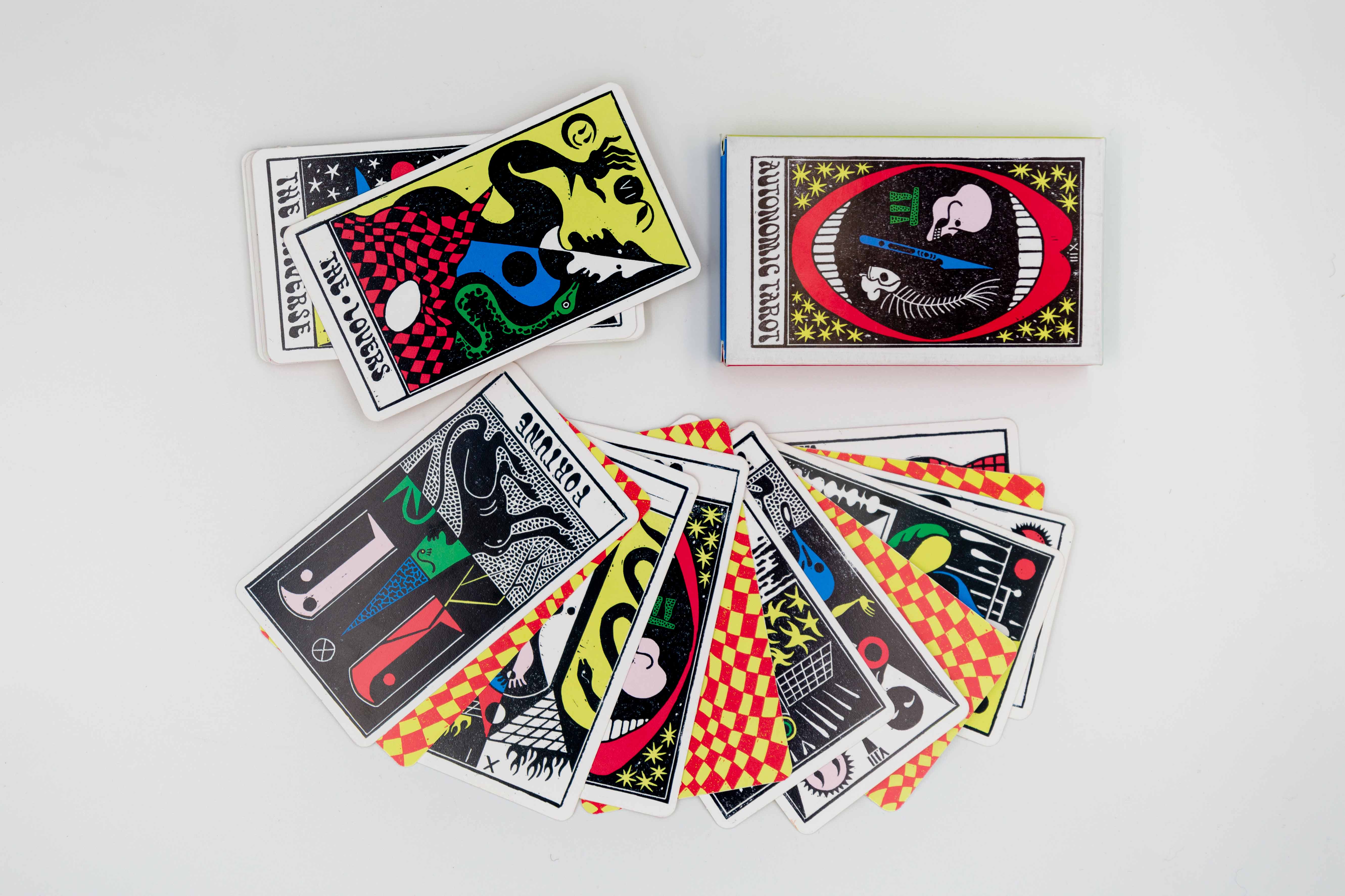 A fanned out deck of colorful tarot cards