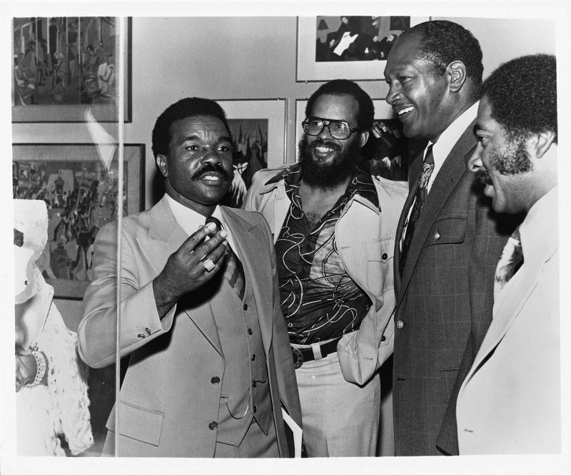David Driskell, Alonzo Davis, Mayor Tom Bradley, and an unidentified man, probably at the exhibition "Two Centuries of Black American Art," curated by Driskell for the Los Angeles County Museum of Art, 1976