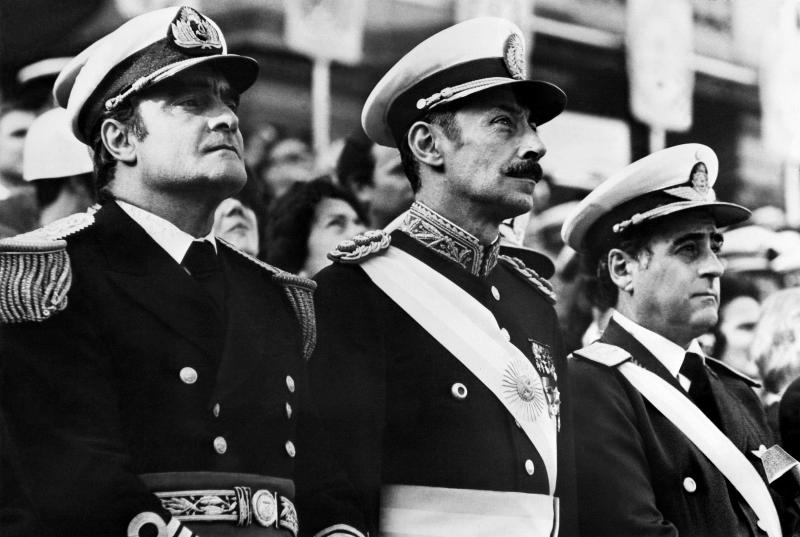 General Orlando Ramon Agosti, Commandant of Argentinian Air Force, Lieutenant General Jorge Rafael Videla, President of Argentina, and Admiral Emilio Massera attend an official ceremony, Argentina, 1977