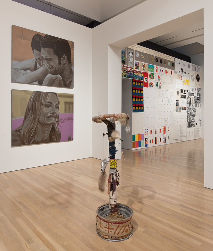 Foreground: Jimmie Durham, "Bedia's Stirring Wheel," 1985; left wall: John Miller, "Everything Is Said 24," 2012 (top), and "Everything Is Said 21," 2012 (bottom); in next gallery: Matt Mullican, "7 1/2 Bulletin Boards," 2013. Installation view at the Hammer Museum, Los Angeles