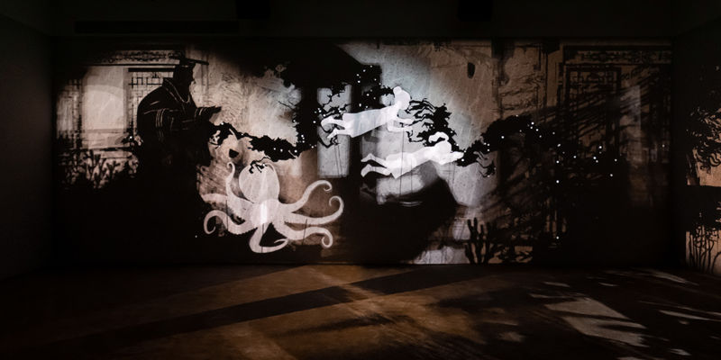 Image of multimedia installation with elements of shadow puppetry