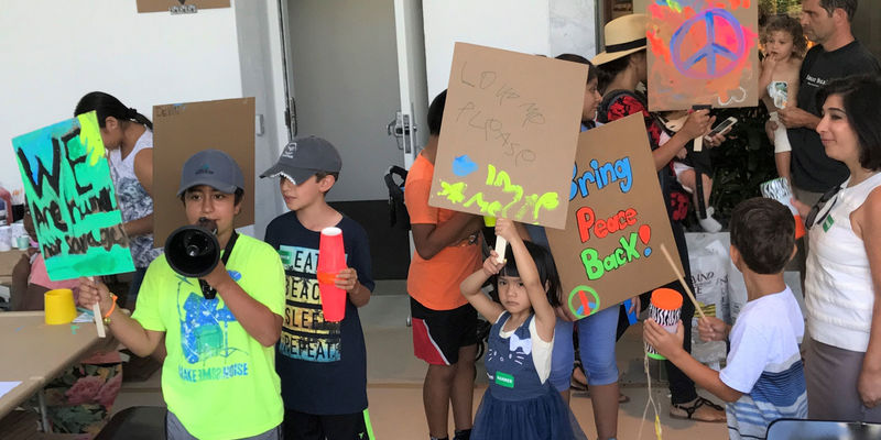 Kids with their protest signs