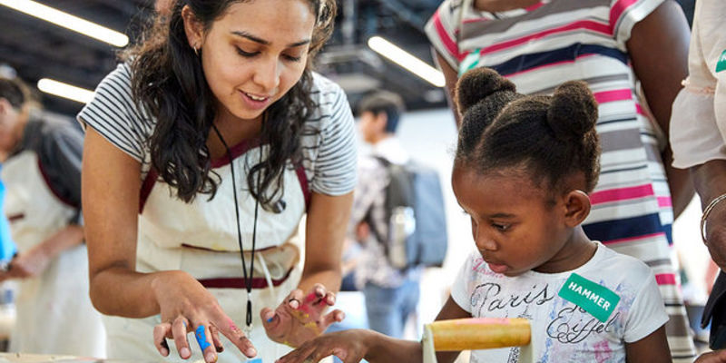 Families created prints celebrating their neighborhoods in a workshop conceived by artist Olga Koumoundouros at Family Day: Kids for Peace. 