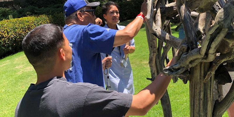 Veterans exploring Deborah Butterfield's Pensive