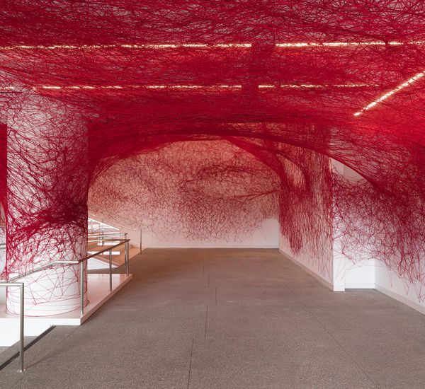 Web of red twine wraps Hammer Museums entire walkway