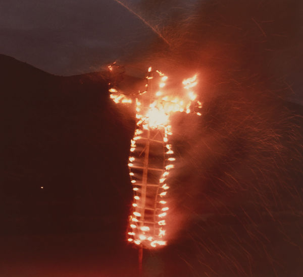 Film still of a flaming effigy
