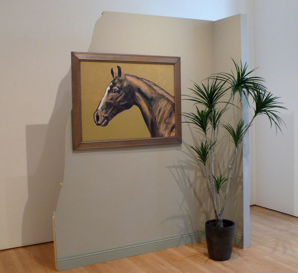 Installation featuring a partial wall with a painting of a horse and a potted plant on the floor