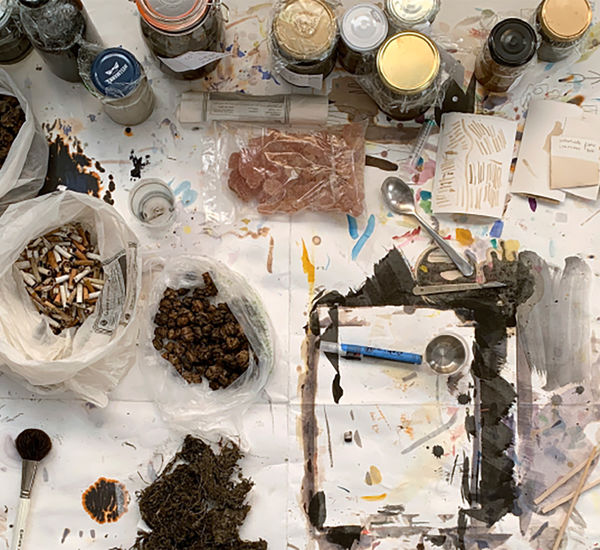 Overhead view of art materials on a table 