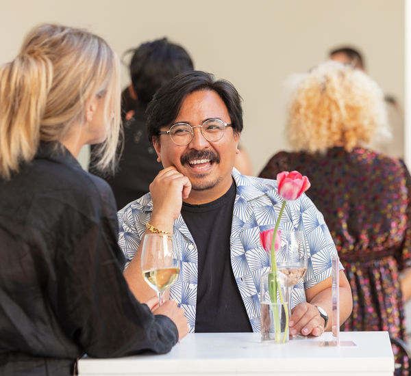 Visitors enjoying drinks at the 2022 summer exhibitions opening