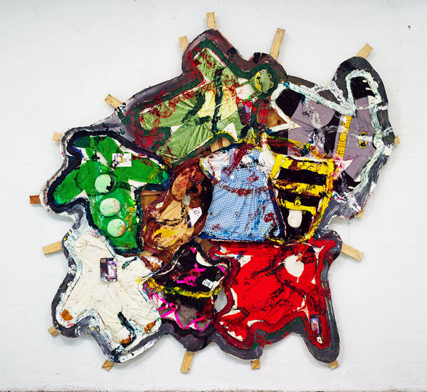 Oddly shaped painting covered with kids Halloween costumes