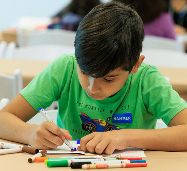 image of boy writing