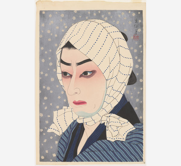 A Japanese woodblock print depicting the bust of a person in 3/4 view, looking to the viewer's left. The person has white skin, red lips, and dark shadows under the eyes, and wears a blue striped piece of fabric over the head and tied under the chin. The figure is wearing a blue striped shirt with black color, and the background is ligh tblue with small white circles as if to depict snow. At upper right is Japanese caligraphy and a red real. 