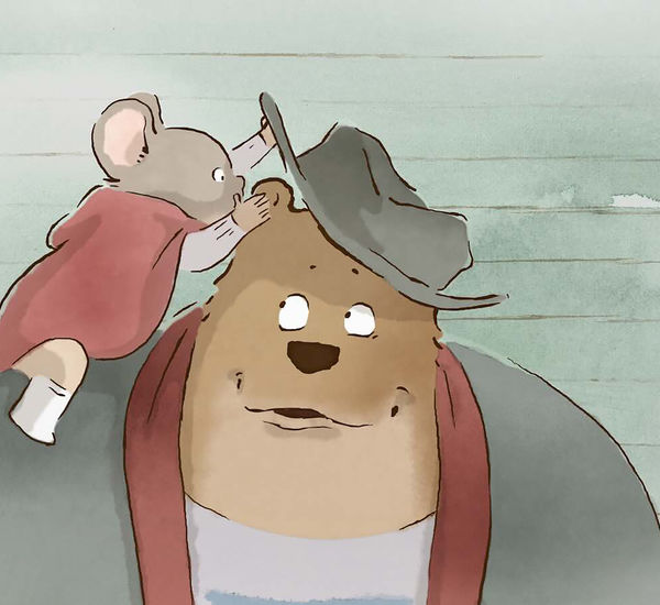 A cartoon mouse in a red cape sits on the shoulder of a bear, lifting the bear's hat to whisper in its ear