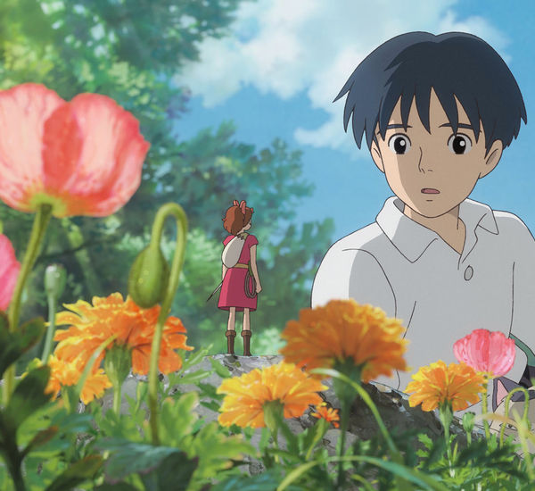 A cartoon boy looks at a tiny girl standing on a flower