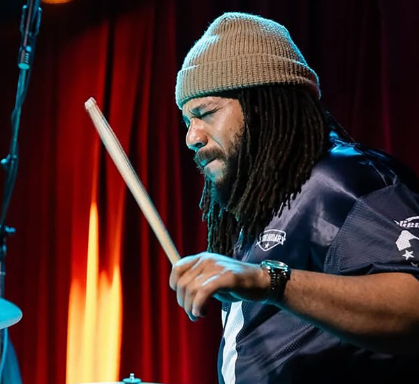 Malachi Whitson plays the drums 