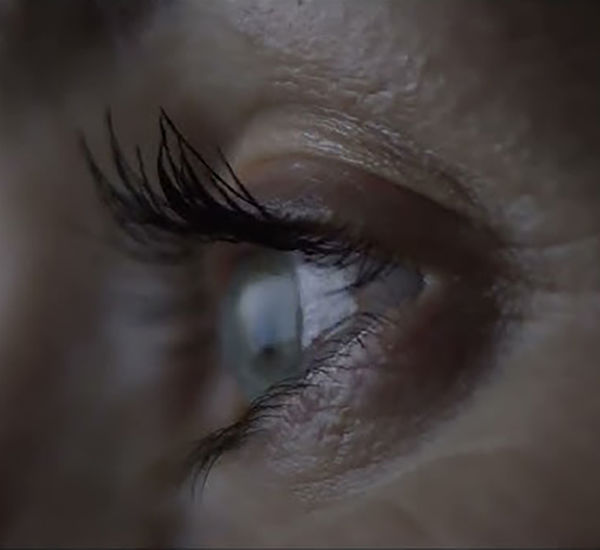 A woman's eye seen in extreme closeup