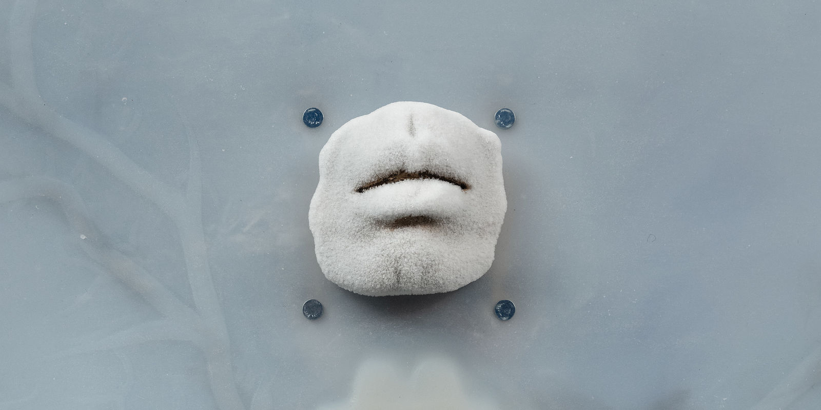 A silicone mouth covered in ice crystals