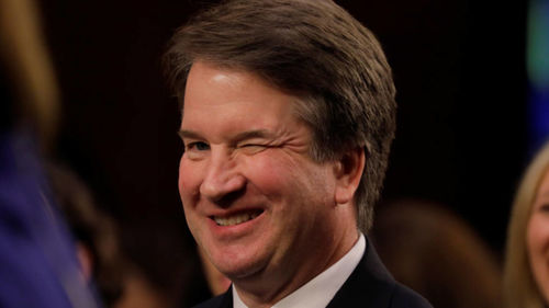 Supreme Court Justice Brett Kavanaugh winks at the camera