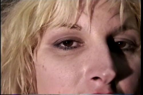 A close-up of a woman's eyes and nose