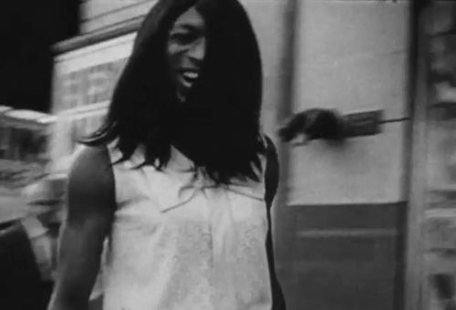 Still from the film Behind Every Good Man (1967) showing a young person smiling