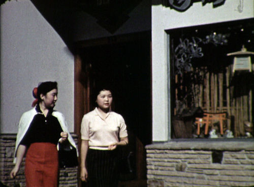 Still from the film The Challenge (1957) showing two young girls walking