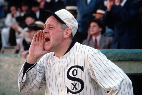 Still from the film Eight Men Out (1988) showing a coach from the White Sox baseball team shout