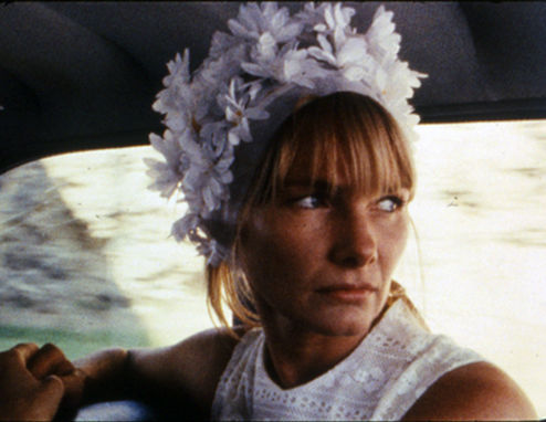 Still from the film Wanda (1971) showing a woman white flowery hat