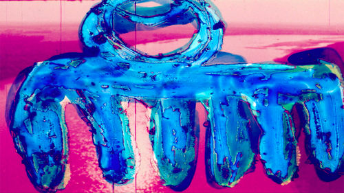 A blue form with six points along the bottom on a pink background