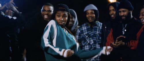 A group of people look at the camera
