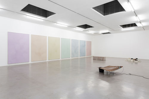 A rainbow of colored squares on a wall