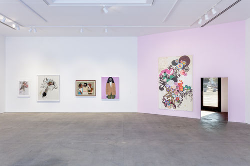 A gallery with a white and a pink wall with five artworks hanging