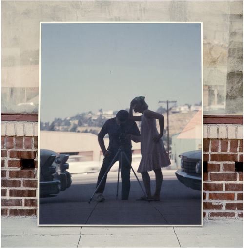 An image of two people leaning into each other