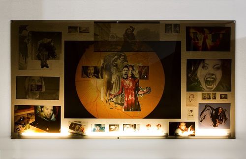 A lightboard covered in collage