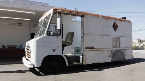 Photo of a rusted, white 1967 Chevrolet Step-Van bread truck