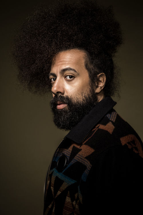 Color photo portrait of Reggie Watts