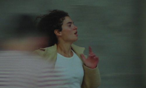 Blurred image of a woman running.