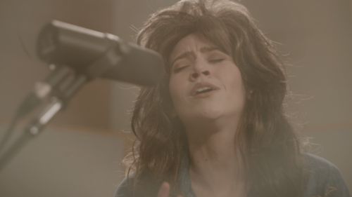 A woman singing.