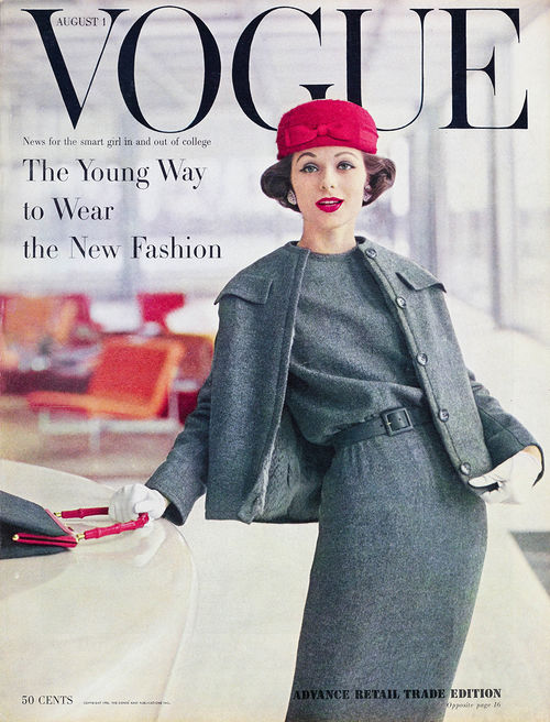 Cover of Vogue magazine, with a color photo of a White woman in a grey suit and red hat, with the headline "The Young Way to Wear New Fashion"