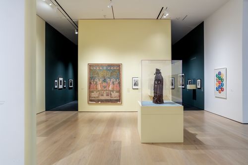 View of a gallery with artworks in a variety of media