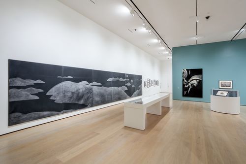 View of a gallery with artworks in a variety of media