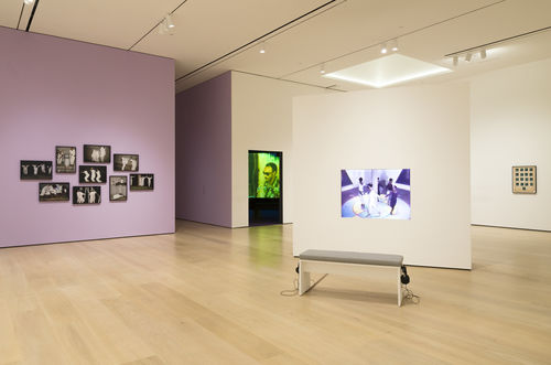 Photo of an exhibition of photo and video works
