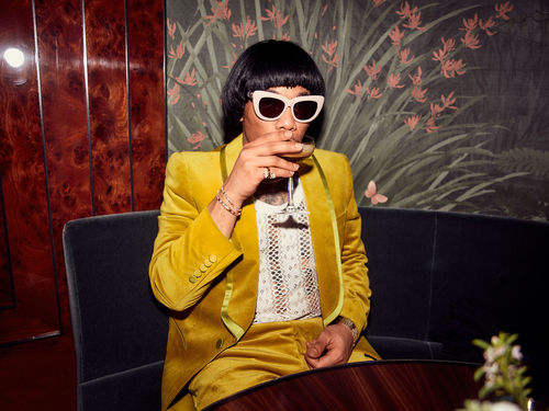 Anderson .Paak drinking from a cocktail