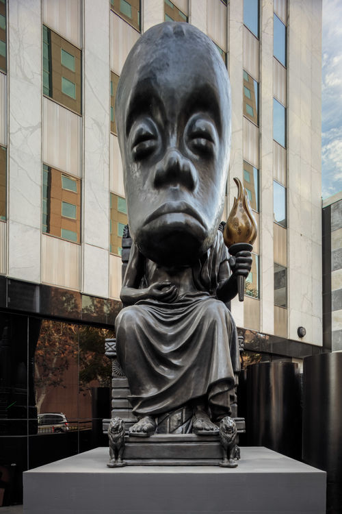 Large monumental sculpture sits on rectangular base