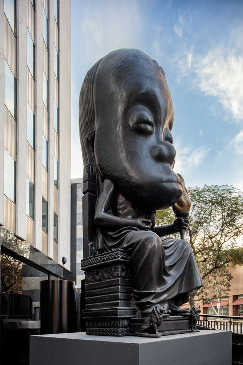 Large monumental sculpture sits on rectangular base