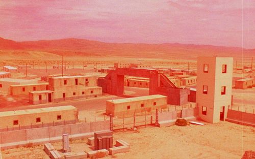 Red wash over a small town