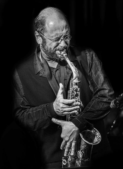 A man playing a saxophone