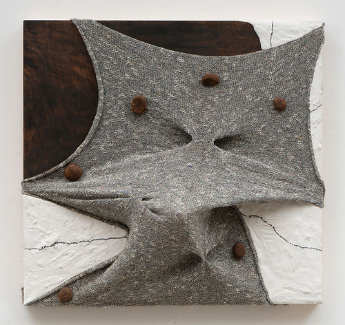 Fabrics stretched and buttoned on canvas