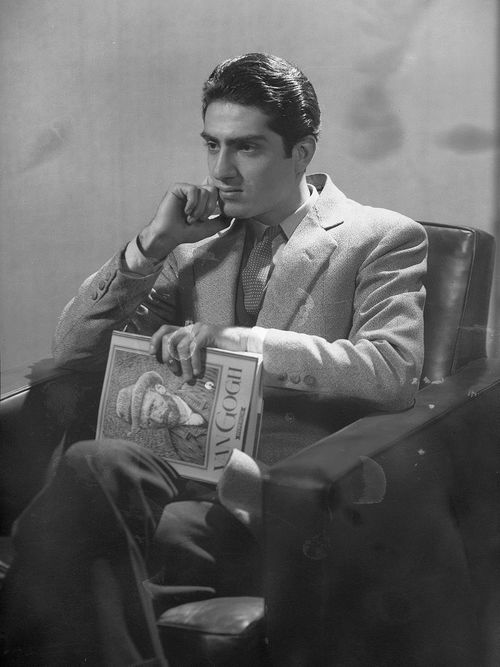 Photo of Van Leo posing in a chair